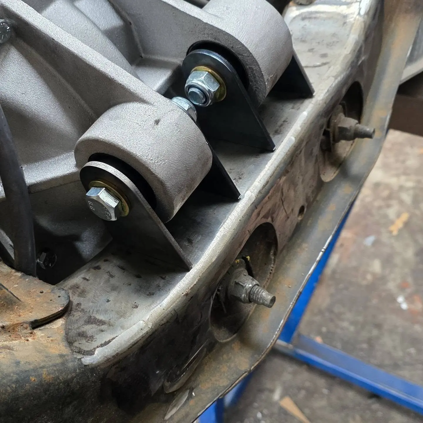 New alloy diff housing sitting in its bushes on a steel bracket on a rear cradle